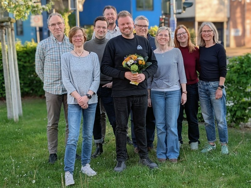 Christian Pelikan mit den Vorstandsmitgliedern aus Moers und Neukirchen-Vluyn